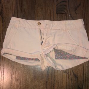 Salmon pastel pink denim shorts